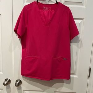 XL figs 3 pocket top, XL high-waisted joggers with yoga band in hot pink.